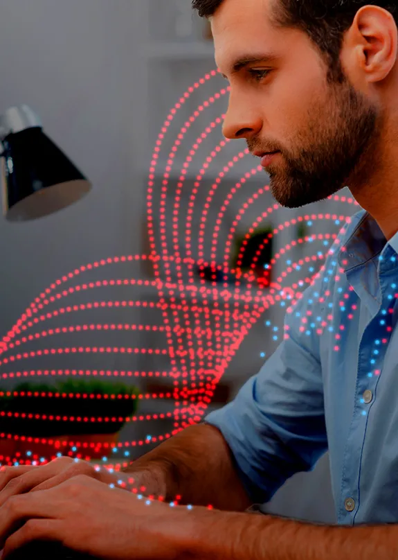 Man typing on laptop